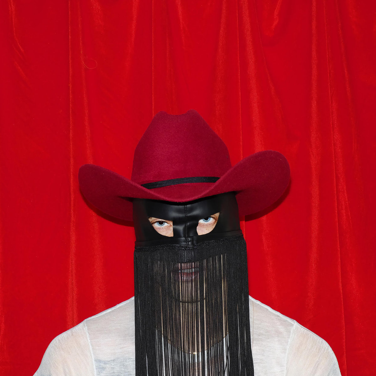 Old fashioned haunted country music… Orville Peck howls, croons, and yodels in a way that is extremely dramatic, yet never quite goes over the top.